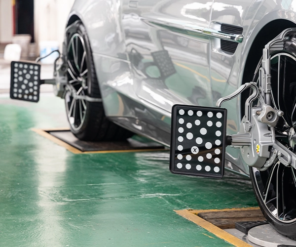 Wheel alignment targets on a car